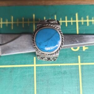 Vintage 925silver,beautiful turquoise stone, hydrographic like carvings on sides